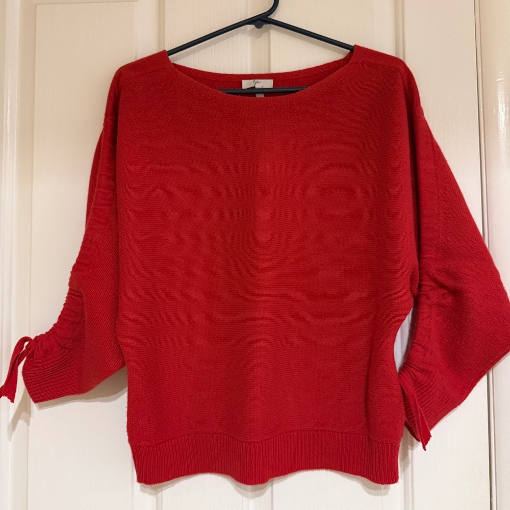 Holiday Red Josie sweater with gathered shoulder to wrist sleeves.